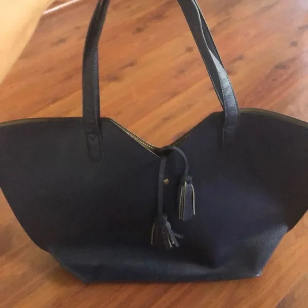 Neiman Marcus navy medium size tote with tassels